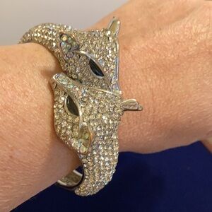 Gorgeous vintage CN stamped crystal pave double fox head hinged bangle